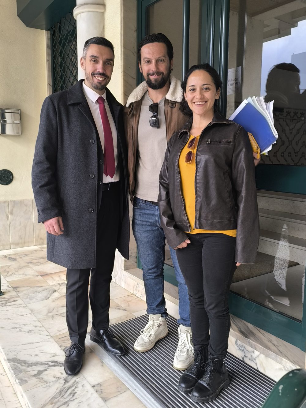 South African and Italian couple celebrate mortgage closing in Portugal with Diogo Almeida