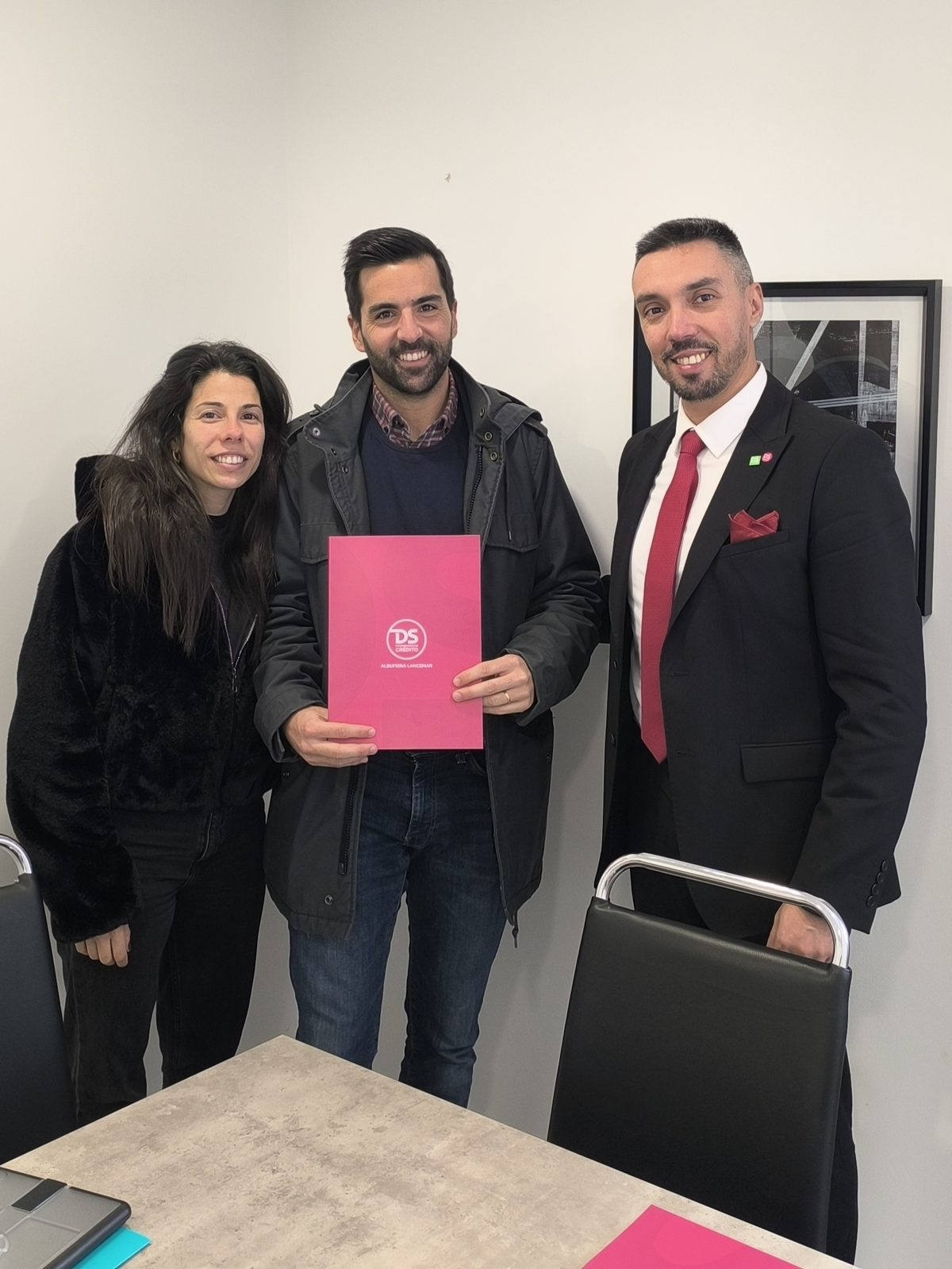 Portuguese couple signs mortgage deed for their home in the Algarve
